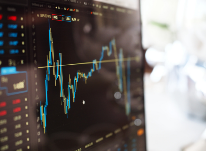 Business professionals reviewing FX strategy